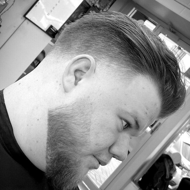 Skin fade with a sculpted, full beard finished at Gallery X Barbershop, Hamilton
